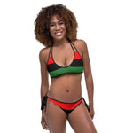 The Pan African bikini typically features the three colors Red, Black and Green that represents African culture, heritage, pride and unity. The overall style of a Pan African bikini is lively, expressive, and celebrates the rich diversity of African aesthetics.